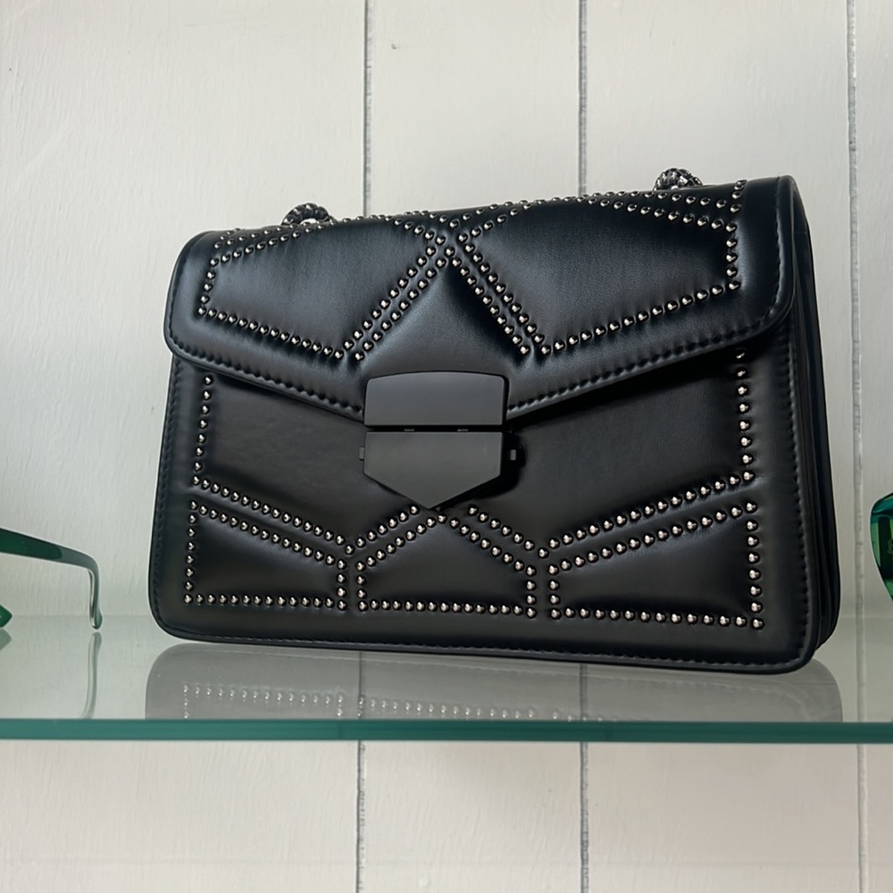 Black geometric studded purse